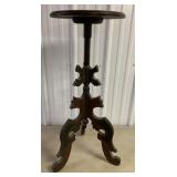 carved leg plant stand