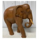 large solid wood carved elephant
