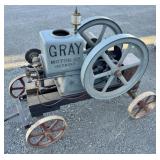 Gray 2 1/2 hp Engine on cart, spark plug engine