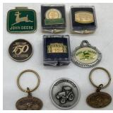 (9) John Deere Keychains/Pins/Emblems