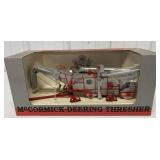 1/28 McCormick Deering Thresher in box