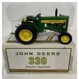 1/16 Ertl John Deere 330 Utility Tractor in box
