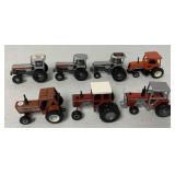 7-1/64th scale tractors; some plastic others metal