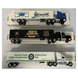 (3) 1:64 scale Ertl Tractor Trailers