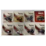 (8) 1:64 Scale White Tractors in blister packs
