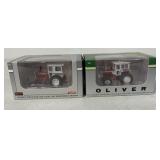2-1/64scale SpecCast  tractors in boxes