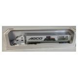 1:64 scale AGCO Peterbilt 387 semi hauler in box