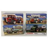 4-1/64 scale Ertl tractors in boxes