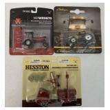 1:64 scale blister packs w/ Hesston & Challenger