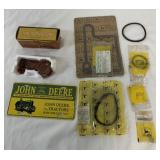 John Deere license plate, parts, and Avon tractor