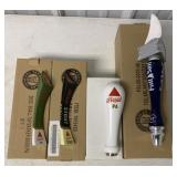 4 assorted beer tap handles