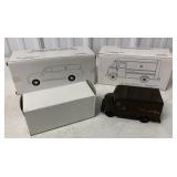 3 UPS trucks in boxes