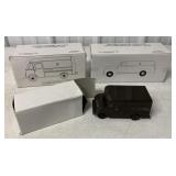 3 UPS trucks in boxes