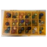 39 marbles in case
