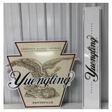 2 Yuengling tin signs
