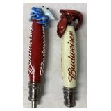 two Budweiser beer taps