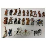 20+ metal figures, mostly cowboys and Indians
