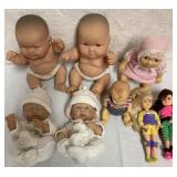 8 dolls and baby dolls