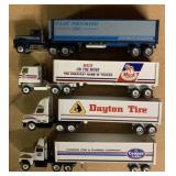 4 trucks-Mack, Cooper Tires, Dayton Tire, & Clay