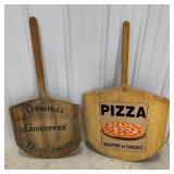2 used pizza boards turned into signage