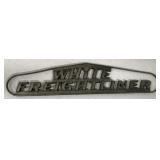 White Freightliner name plate