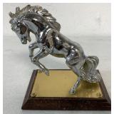 White Horse Hood Ornament on Wood