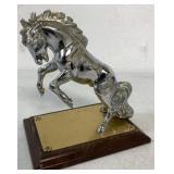 White Horse Hood Ornament on Wood