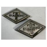 2 Diamond T truck badges