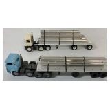 (2) 1/64 custom tractor trailers hauling pipe