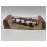 1/16 International 4 Btm Plow in Bubble Box