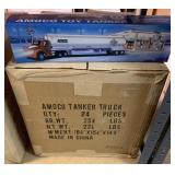 21 Amoco Tanker trucks in case which held 24