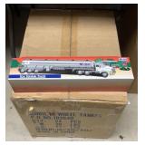 21 Mobil Tanker Trucks in case that held 24