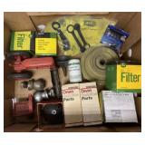 lot of John Deere parts, hitch balls, toys etc.