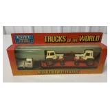 1/64 Ertl Mack Flatbed w/ Tractors in box