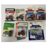 (7) 1/64 Ertl tractors in blister packs