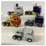 (5) 1/64 customized semi trucks, no trailers
