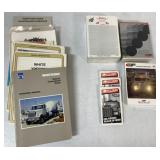 lot of trucking notepads, operator manuals, etc.