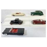 5 plastic model cars