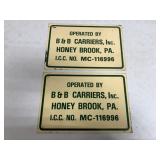 2 metal B & B Carriers, Inc. signs