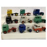 (9) 1/64 customized semi trucks, no trailers