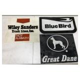 3 partial pieces of mud flaps with advertising