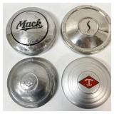 4 hubcaps: Diamond T, Mack, Fruehauf and