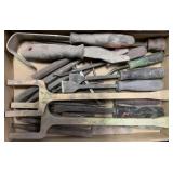 lot of scrapers, punches, etc.