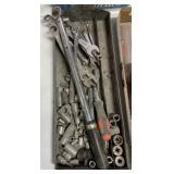 assorted size drive sockets and wrenches