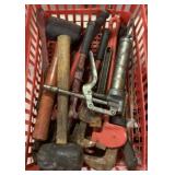 basket of hammers, bolt cutters, pipe wrenches,