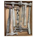 box of mostly hammers and hammer heads