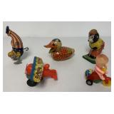 5 wind-up and friction toys