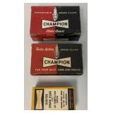 2 full boxes of Champion spark plugs + Igniter