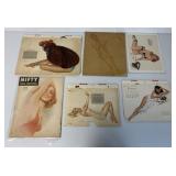 lot of pin-up calendars and other pinups