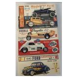 3 AMT model car kits partially assembled